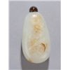 Image 1 : Jade pebble form snuff bottle, russet inclusions