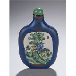 A blue yixing snuff bottle with enameled panels.