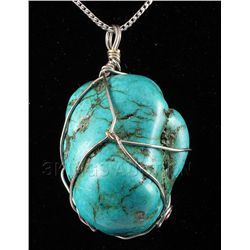 NATURAL 249.40CTW TURQUOISE WIRE WRAPPED PENDANT