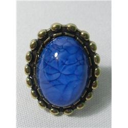 28CTW ROYAL BLUE OVAL BRASS RING SIZE 6