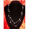 Image 1 : NATURAL 50.00 CTW FLOATING WHITE PEARL NECKLACE