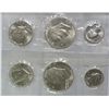 Image 2 : 2  3 pc BU 1976 silver sets no boxes also a holder with 76 ps and  a silver half