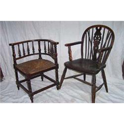 LATE GEORGIAN OAK WINDSOR ARMCHAIR with pierced rounded splat