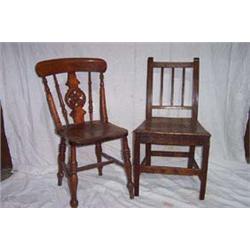 SET OF FOUR BEECH KITCHEN CHAIRS with pierced rounded splat and railed back