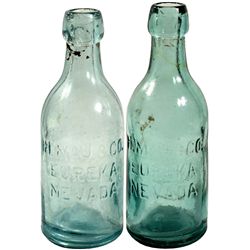 H. Mau Pair of Soda Bottles
