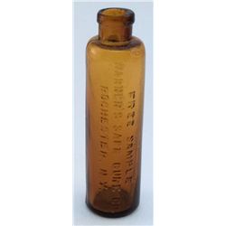 Free sample bottle. Brown. Warner's Safe Cure Co.