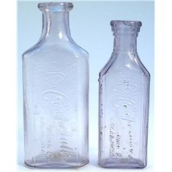 Druggists bottles-small light lavender pair-Both are embossed/Co-operative/DRUG CO./LOGAN UTAH-embos
