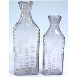 Pair- Park City medecince bottles-M.D. HURLBUT/DRUGGIST/PARK CITY, UTAH-embossing of fan on left han
