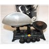 Image 1 : Vintage cast iron scale including weights The scale is black cast iron with a c