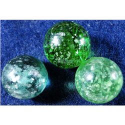 Marbles: Lot 25. 2 Micas & 1 Clearie. 2 Mint, 1 NM-.
