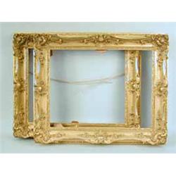 A pair of carved gesso and gilt picture frames