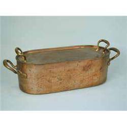 A 19th century copper fish kettle