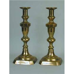 A pair of 19th century brass candlesticks