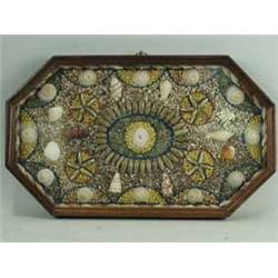 A Barbadian shell picture in an elongated octagonal frame