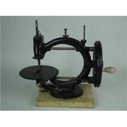 A Wanzer time utilizer sewing machine with a 'C' shaped frame
