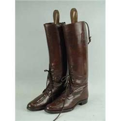 A pair of ladies brown leather riding boots Est.60/8