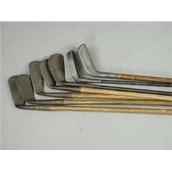 Two Miles patent putters and four further clubs Est.40/6