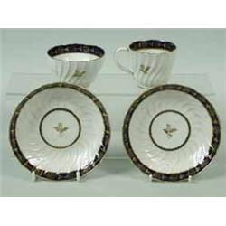 A 19th century English blue and gilt tea bowl and saucer