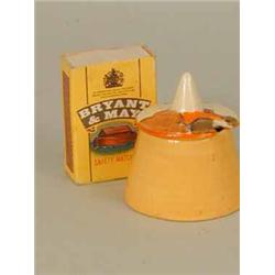 A Clarice Cliff conical mustard pot and cover