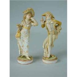 A pair of French Vion and Bavry figures of a lady and a gentleman