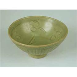 An 18th Century celadon bowl with incised decoration