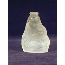 An opalescent glass figure Madonna and Child