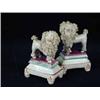 Image 1 : A pair of Staffordshire pottery poodles.  10cm high Est.250/30