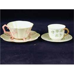 A 1st period Belleek Thorn pattern tea cup and saucer