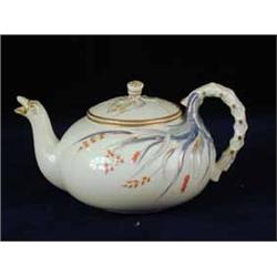 A 1st period Belleek grass pattern teapot and cover