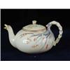 Image 1 : A 1st period Belleek grass pattern teapot and cover