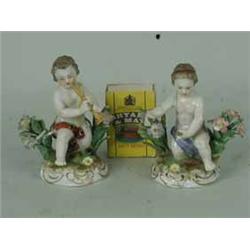A pair of late 19th century continental porcelain putti