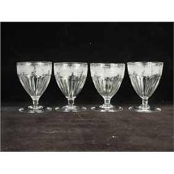 Four 19th century glass rummers