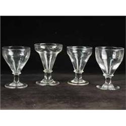 Four 19th century glass rummers