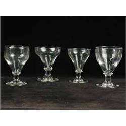 Four 19th century glass rummers