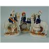 Image 1 : A pair of Staffordshire figures of children in Scottish costume standing beside sheep