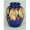 Image 1 : A Moorcroft blue glazed baluster vase