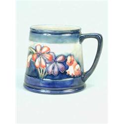 A Moorcroft tapering cylindrical mug