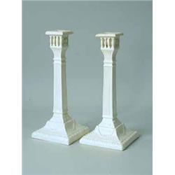 A pair of creamware candlesticks