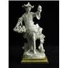 Image 1 : A continental pottery figure of a Chinese fruit seller on a gold painted wooden plinth