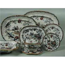An Ashworth dinner set comprising four graduated meat plates
