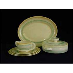 A Clarice Cliff bizarre six setting part dinner service
