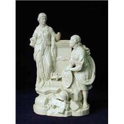 An early 19th century creamware figure group