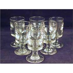 Six deceptive wine glasses