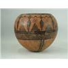 Image 1 : An antique oriental pottery vase painted in black with figures and geometric motifs