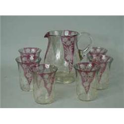 A 1920's glass lemonade set with coloured and etched decoration