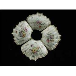 Four Dresden shell shaped supper plates painted with flowers