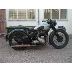 A 1949 BSA M20-591 500cc motorcycle with a side car