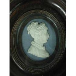 A 19th century Jasperware oval portrait miniature of a lady