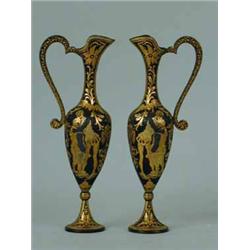 A pair of Toledo (?) metal end inlaid urns