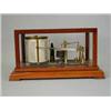Image 1 : A Negretti and Zambra barograph in a mahogany and glazed cabinet